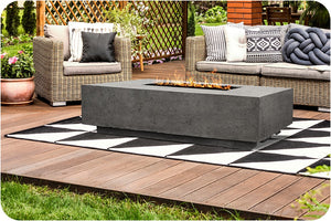 Lifestyle Image of the Tavola 8 Concrete Fire Table