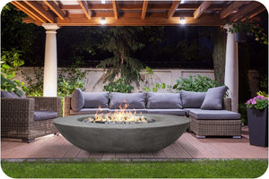 Lifestyle Image of the Ovale Concrete Fire Table