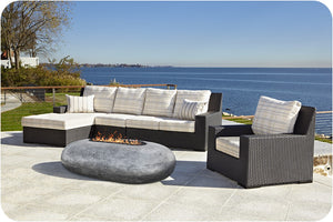 Lifestyle Image of the Pebble Concrete Fire Table
