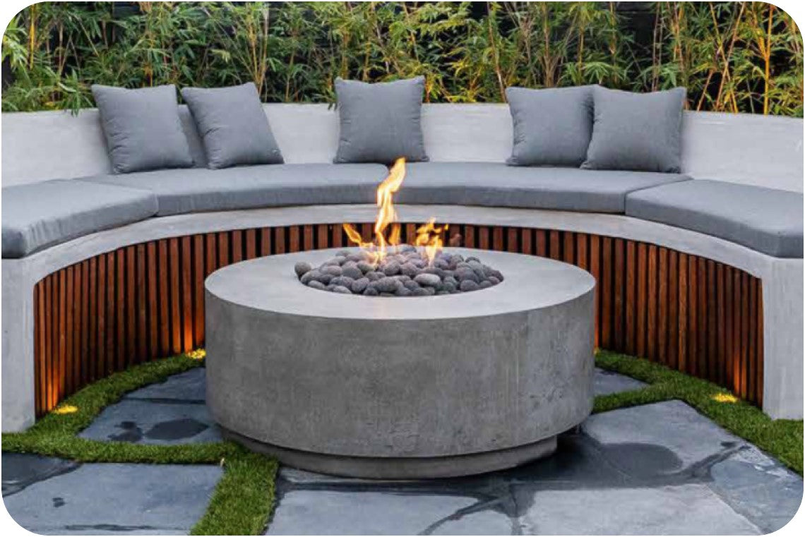 Lifestyle Image of the Rotondo Concrete Fire Table