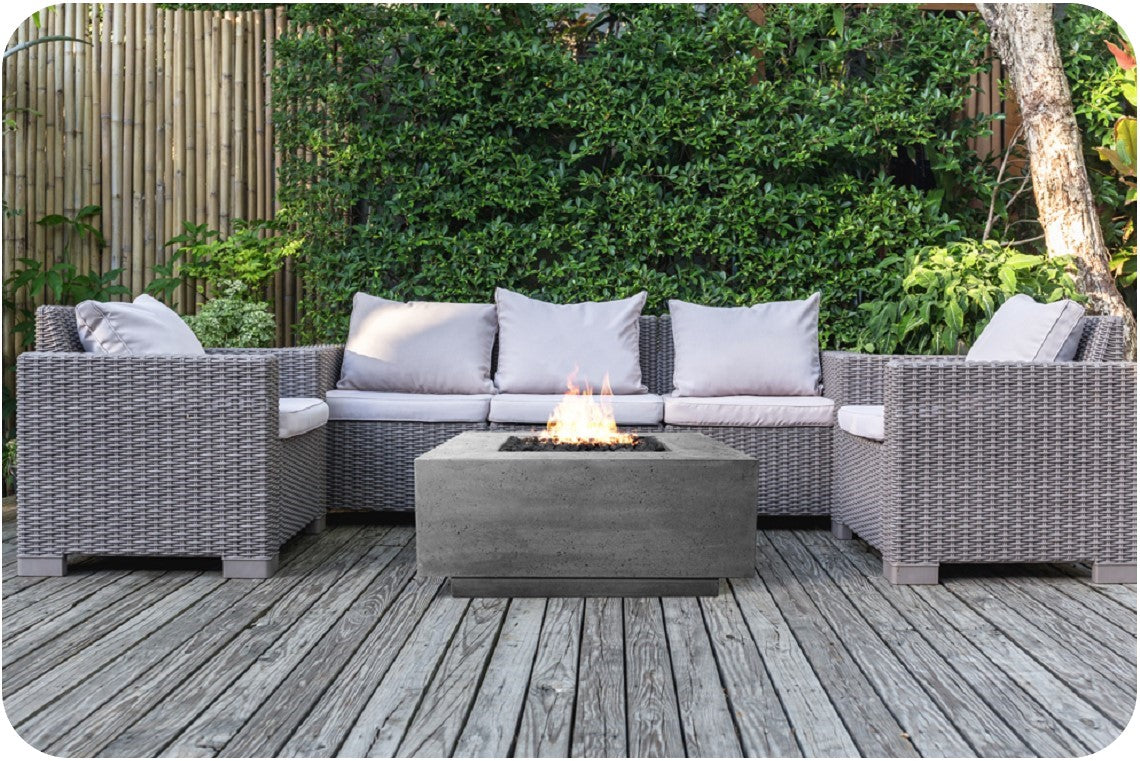 Lifestyle Image of the Tavola 2 Concrete Fire Table